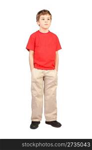 little boy in red shirt hands in pockets standing on white background