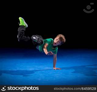 Little boy in sports hall isolated