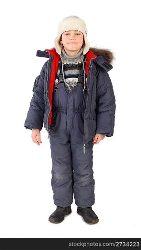 little boy in winter dress standing and smiling isolated on white background