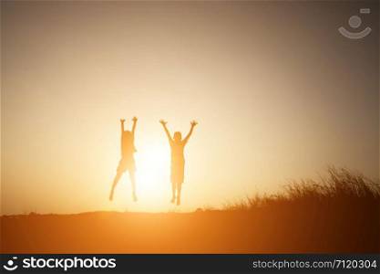 little boy jumping to sky and having happy time, Silhouette concept