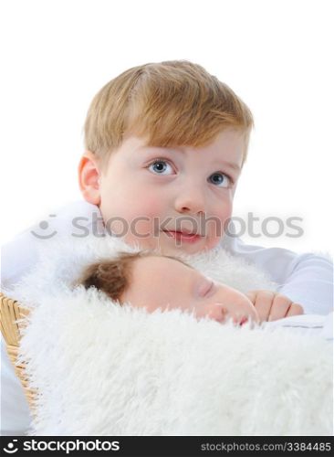 little boy looks at the sleeping brother. Isolated on white background