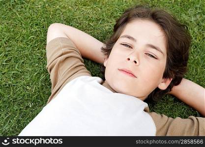 Little Boy Lying on the Grass