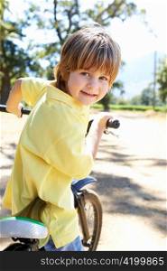 Little boy on country bike ride