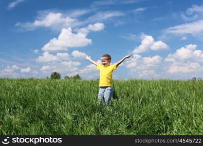 little boy outdoors in sunny summer day