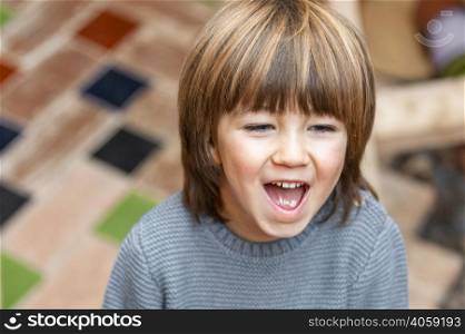 little boy outdoors smiling 3