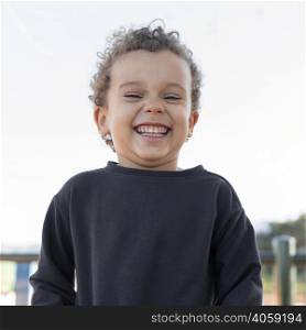 little boy outdoors smiling 4