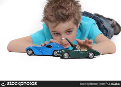 little boy playing car