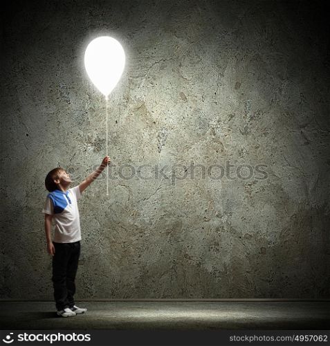 Little boy playing. Image of little cute boy playing with balloon