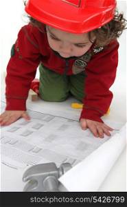 Little boy pretending to be architect