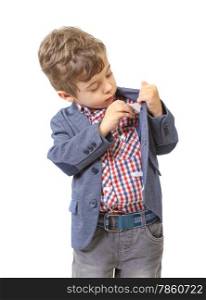 little boy puts money in his pocket on white background
