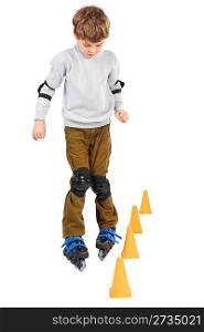 little boy rollerblading near orange cones looking down isolated on white