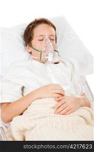 Little boy sick in the hospital, breathing with the help of a respirator.