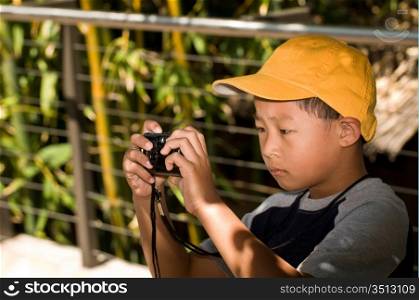 Little Boy Taking Pictures