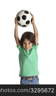 Little boy throwing a soccer ball on white background