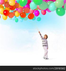 Little boy with balloons