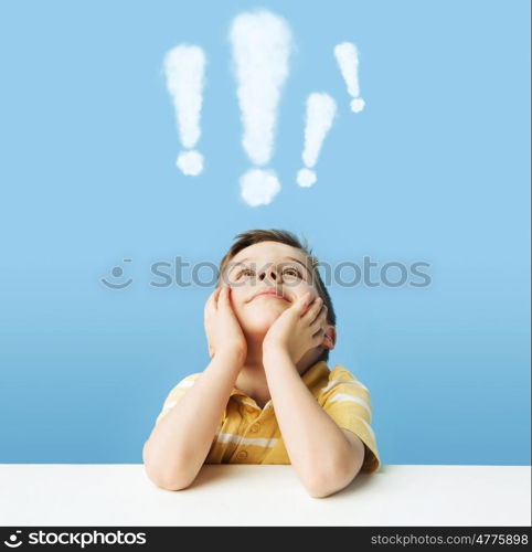 Little boy with exclamation marks above head