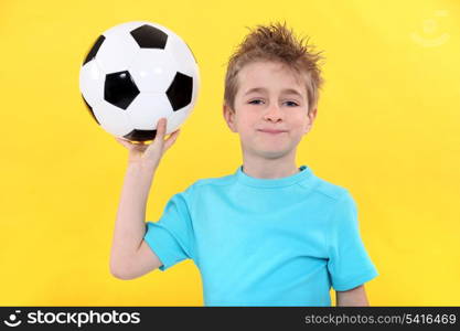 Little boy with football