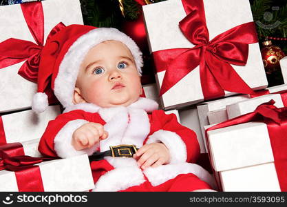 Little boy with gift boxes.