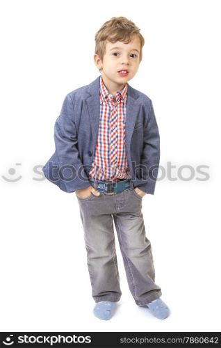 little boy with his hands in pocket on white background