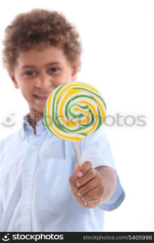 Little boy with lollipop