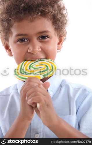little boy with lollipop