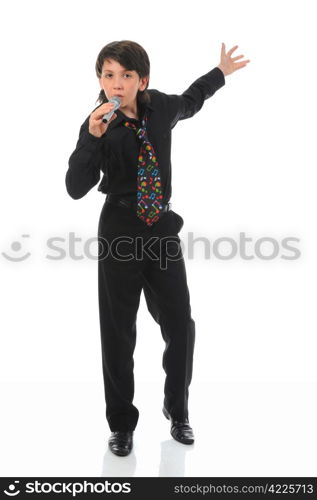 Little boy with microphone sings a song. Isolated on a white background