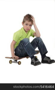 Little boy with skate board