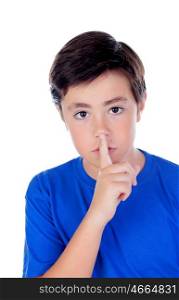 Little boy with ten years old indicating silence isolated on a white background
