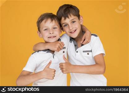 little brothers holding each other. High resolution photo. little brothers holding each other. High quality photo