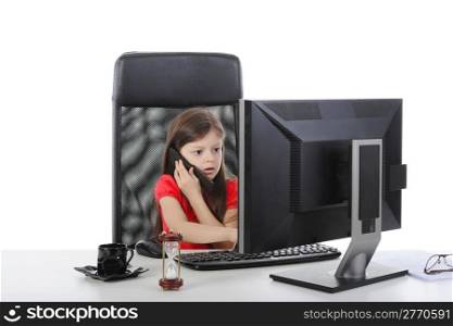 Little business woman sitting at a computer. Isolated on white background
