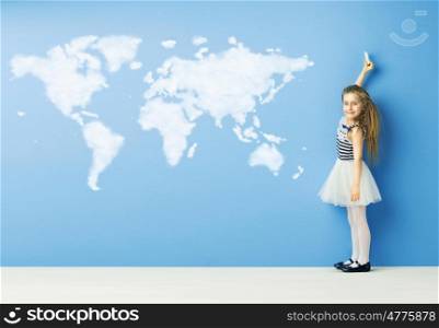 Little child drawing a world map