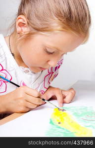 little child drawing on a white background.