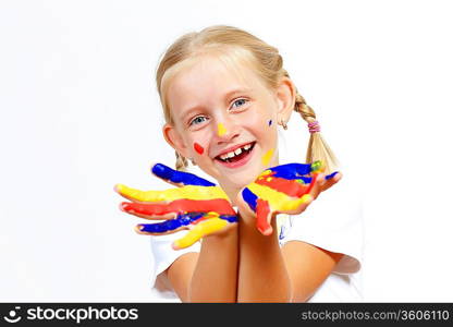 little child with hands painted in colorful paints ready for hand prints