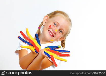 little child with hands painted in colorful paints ready for hand prints