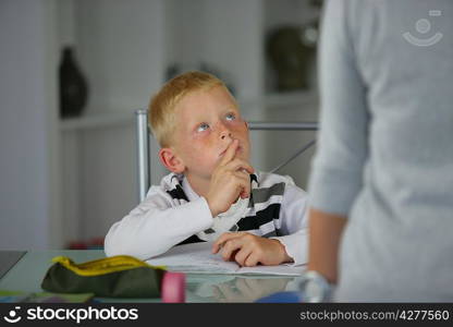 Little concentrating on his homework