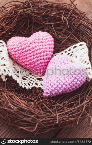 Little cozy nest with two crochet hearts. Valentine&#39;s day decorations