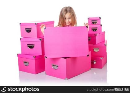 Little cute girl with lots of boxes