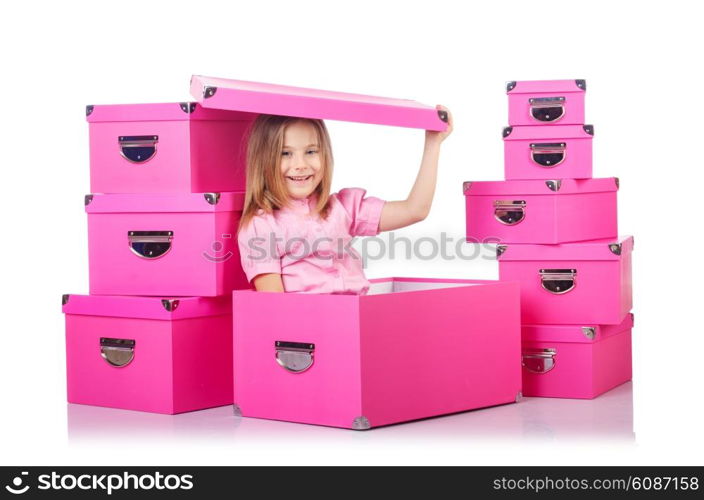 Little cute girl with lots of boxes