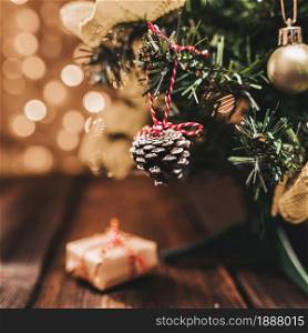 little decorated fir tree on wood desk . Resolution and high quality beautiful photo. little decorated fir tree on wood desk . High quality and resolution beautiful photo concept