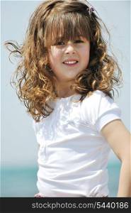 little female child portrait on beautiful beach
