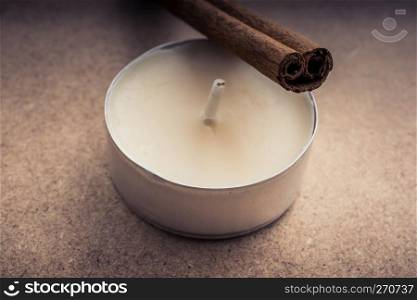 Little flat candle on a background
