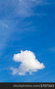 little fluffy cumulus cloud in blue sky in summer day
