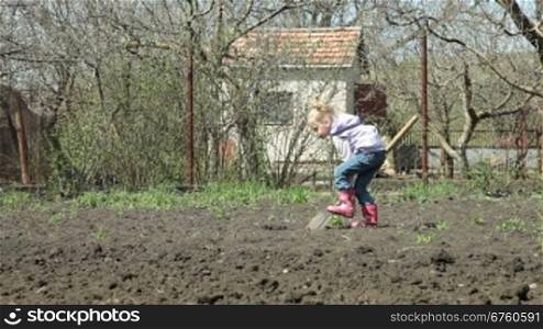Little Gardener Digging on Smallholder Farm