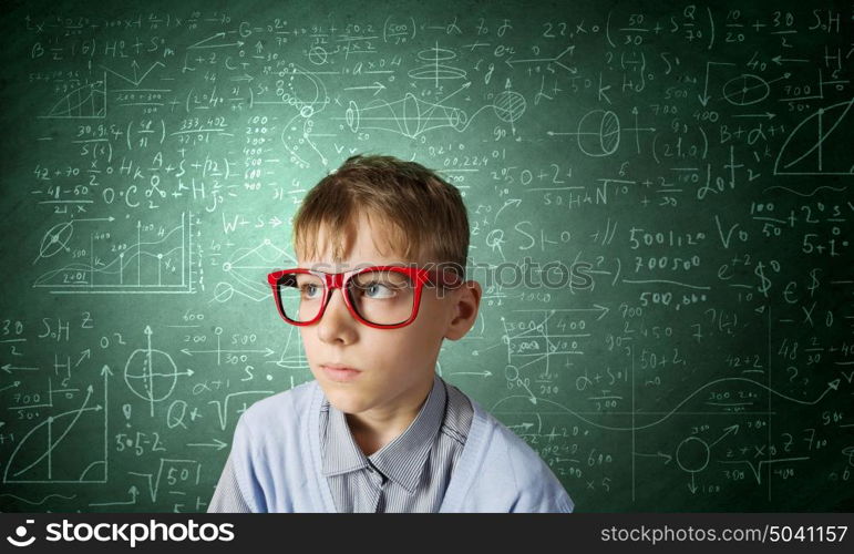 Little genius. Boy of school age in glasses. Idea concept