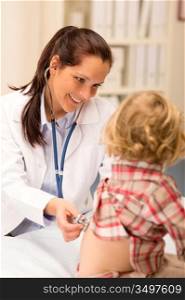 Little girl being examine with stethoscope by pediatrician