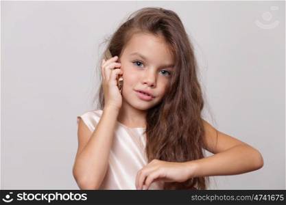 little girl calling by phone