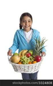 Little girl carrying a fruit basket