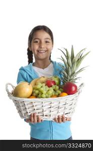 Little girl carrying a fruit basket