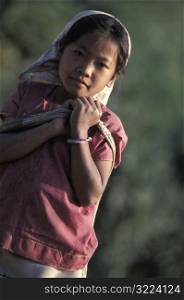 Little Girl Carrying Bag