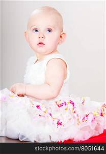 Little girl child portrait. Lovely little child girl in princess fairy dress. Portrait of cute beauty sweet baby ballerina.